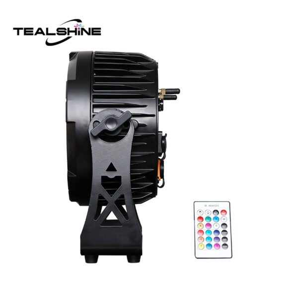 Side view of a black IP65 Advanced Battery Powered Par Uplighting LED stage light, featuring a finned heat sink, mounting bracket, and an included multi-color remote control; TealShine logo displayed in the top left corner.