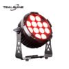 The IP65 Avanced Battery Powered Par Uplightings is a round, black LED stage light featuring twelve illuminated bulbs that emit red and white light. Mounted on a metal stand, it provides versatile battery-powered uplighting ideal for dynamic event setups. The TEALSHINE logo is displayed in the top left corner.